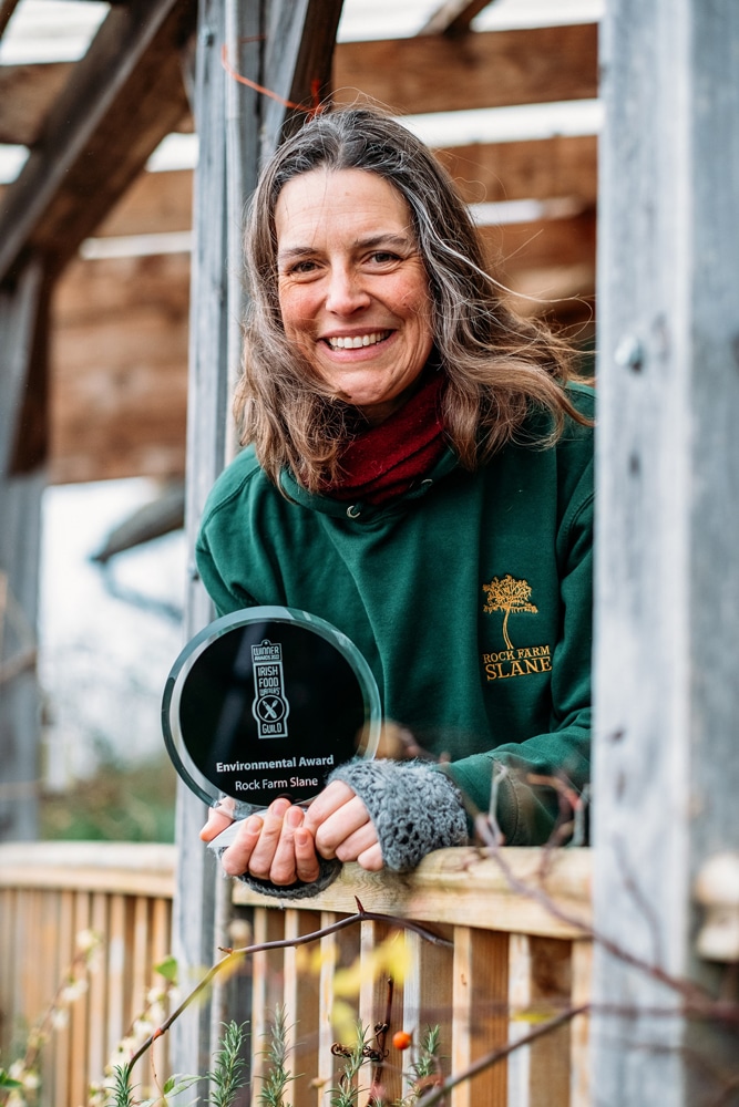 Carina Conyngham showing her Environmental Award for Rock Farm Slane