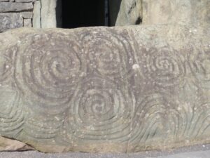 Triple Spiral carved into stone at newgrange